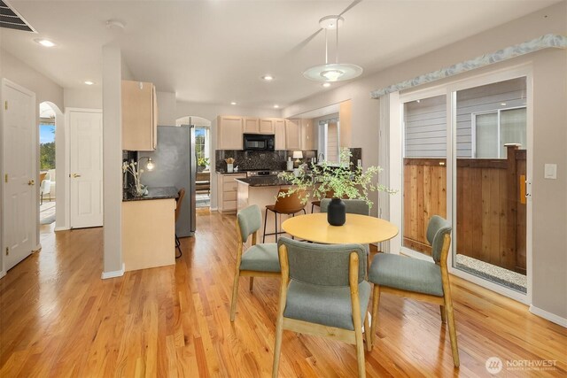 3316 Main Ave S, Renton, WA 98055 - dining room with light wood-type flooring, recessed lighting, and baseboards