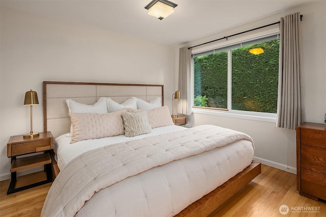 4439 158th Ave SE, Bellevue, WA 98006 - bedroom featuring wood finished floors and baseboards