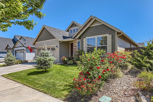 12911 NE 61st Ave, Vancouver, WA 98686 - craftsman-style house with a garage, concrete driveway, and stone siding