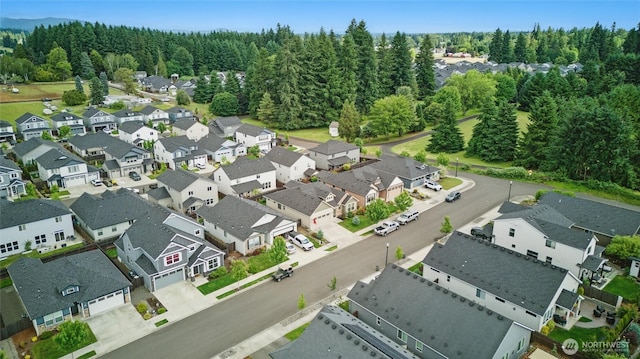 12911 NE 61st Ave, Vancouver, WA 98686 - aerial perspective of suburban area with a forest