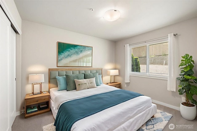3123 148th St SW Unit A6, Lynnwood, WA 98087 - carpeted bedroom with baseboards and a closet
