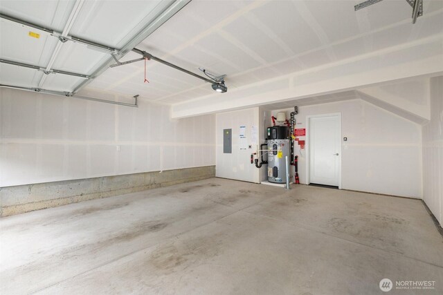 3123 148th St SW Unit A6, Lynnwood, WA 98087 - garage featuring water heater, electric panel, and a garage door opener