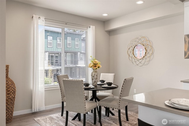3123 148th St SW Unit A6, Lynnwood, WA 98087 - dining area featuring light wood-style flooring, baseboards, and recessed lighting