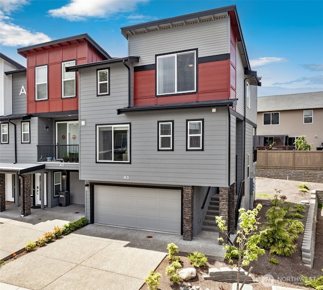 3123 148th St SW Unit A6, Lynnwood, WA 98087 - townhome / multi-family property with an attached garage and concrete driveway