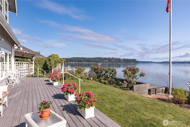 817 Shorecrest Dr, Oak Harbor, WA 98277 - wooden terrace featuring a water view and a lawn