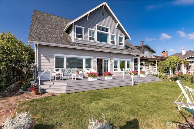 817 Shorecrest Dr, Oak Harbor, WA 98277 - back of house with an outdoor living space, a lawn, a wooden deck, and a shingled roof