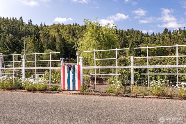 817 Shorecrest Dr, Oak Harbor, WA 98277 - view of community featuring a gate and a forest view