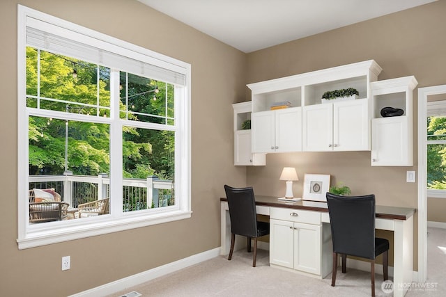 4503 229th Pl SE, Sammamish, WA 98075 - office featuring built in study area, baseboards, and light colored carpet