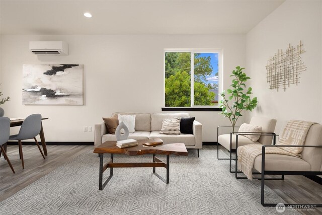 9245 Kelsey Ln SW, Seattle, WA 98106 - living room with a wall mounted AC, light wood-type flooring, and recessed lighting