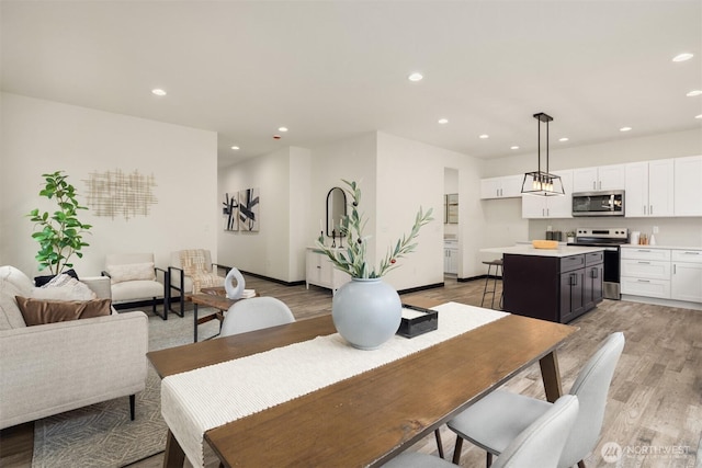 9245 Kelsey Ln SW, Seattle, WA 98106 - dining area featuring recessed lighting and light wood-style floors