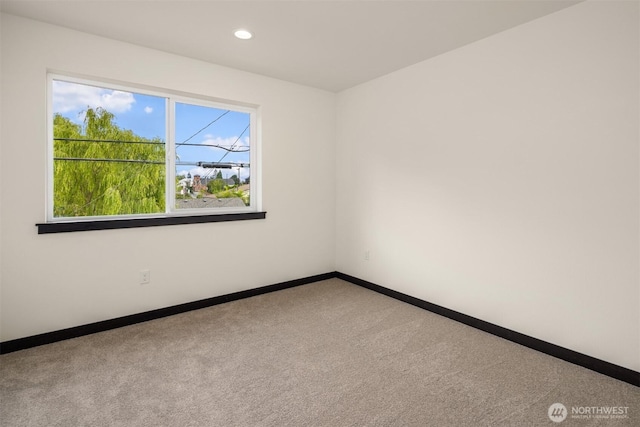 9245 Kelsey Ln SW, Seattle, WA 98106 - empty room with carpet flooring and recessed lighting