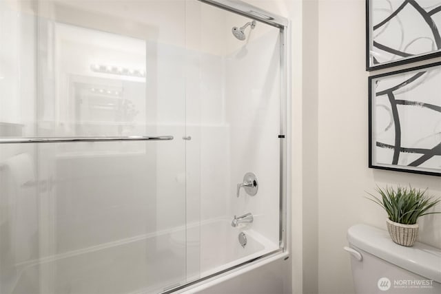 9245 Kelsey Ln SW, Seattle, WA 98106 - full bathroom featuring toilet and shower / bath combination with glass door
