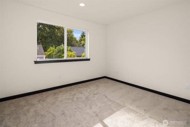9245 Kelsey Ln SW, Seattle, WA 98106 - spare room featuring carpet and recessed lighting