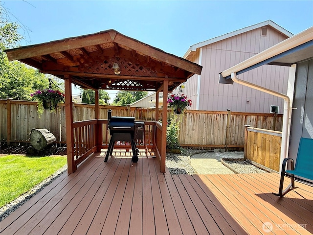 4304 Seville Dr SE, Lacey, WA 98503 - wooden terrace with a fenced backyard, a gazebo, and a grill