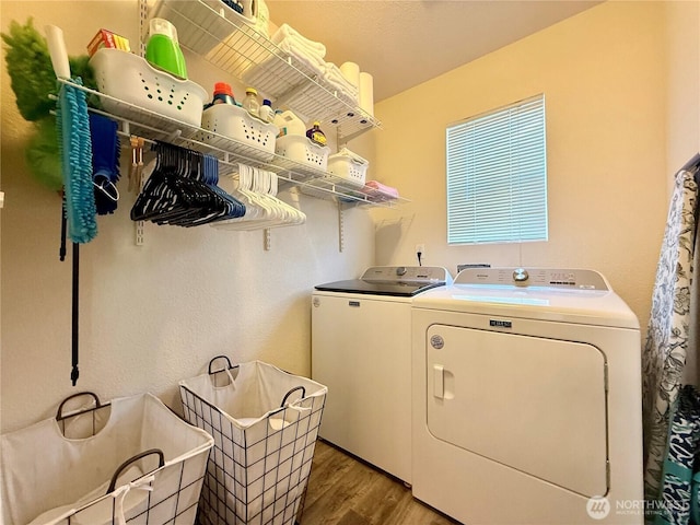 4304 Seville Dr SE, Lacey, WA 98503 - laundry area with separate washer and dryer and wood finished floors