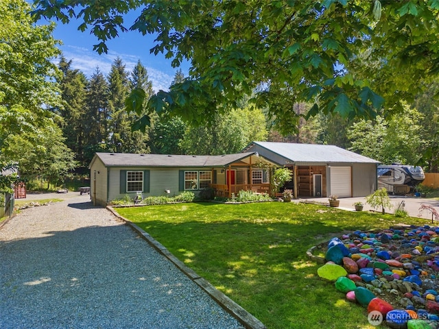 16605 259th Avenue Ct E, Buckley, WA 98321 - ranch-style house with gravel driveway, a front yard, and a garage