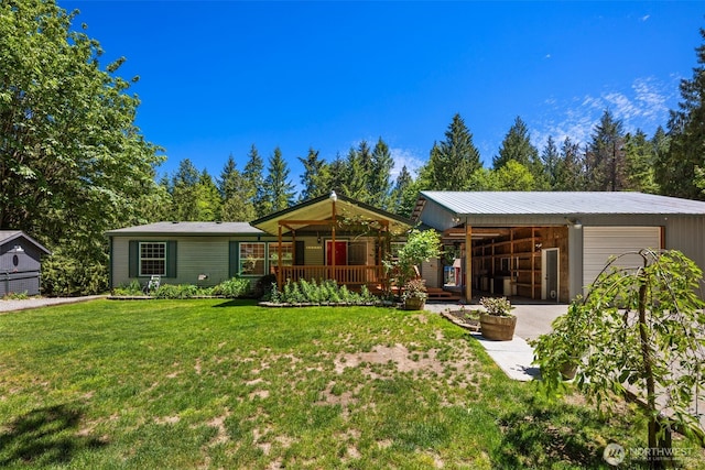 16605 259th Avenue Ct E, Buckley, WA 98321 - ranch-style home with a front yard, a carport, concrete driveway, an attached garage, and covered porch