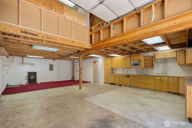 16605 259th Avenue Ct E, Buckley, WA 98321 - garage with a wood stove