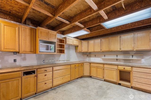 16605 259th Avenue Ct E, Buckley, WA 98321 - kitchen with open shelves, concrete floors, light brown cabinets, stainless steel microwave, and light countertops