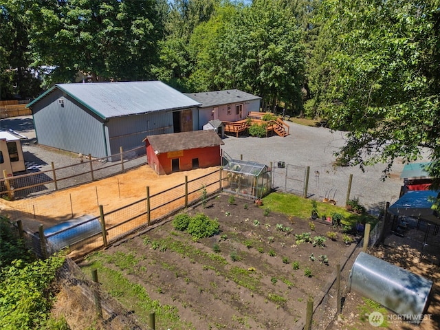 16605 259th Avenue Ct E, Buckley, WA 98321 - view of yard with an outdoor structure, a deck, and a greenhouse