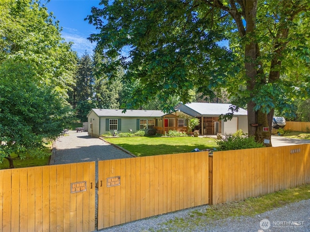 16605 259th Avenue Ct E, Buckley, WA 98321 - view of front of property with a gate and gravel driveway