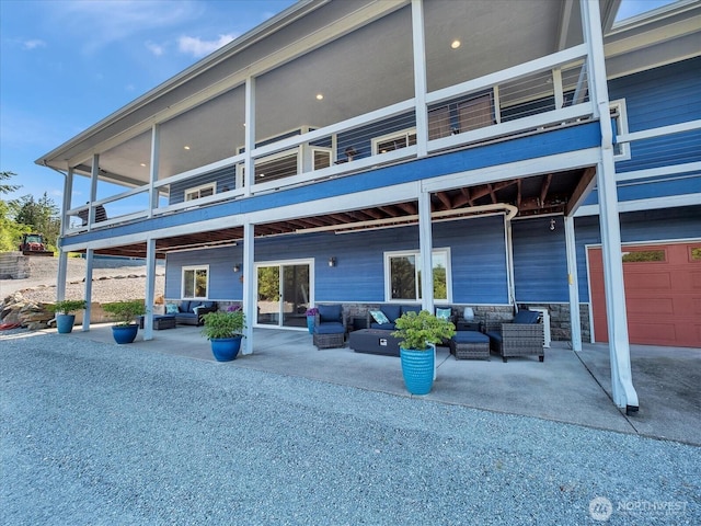 18754 Kim Pl, Burlington, WA 98233 - rear view of property featuring an outdoor hangout area and a patio area