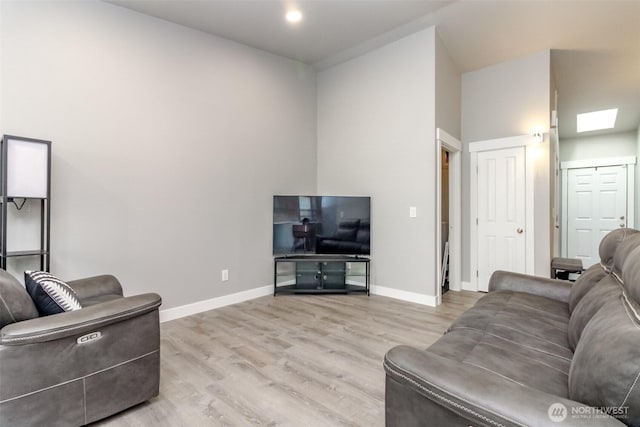 28209 241st Ave SE, Maple Valley, WA 98038 - living area with light wood-style floors and baseboards