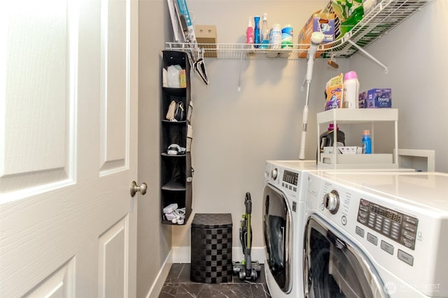 28209 241st Ave SE, Maple Valley, WA 98038 - washroom with independent washer and dryer, dark marble finish flooring, and baseboards