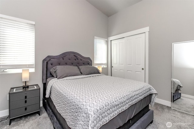 28209 241st Ave SE, Maple Valley, WA 98038 - bedroom featuring light colored carpet, a closet, high vaulted ceiling, and baseboards
