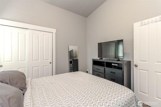 28209 241st Ave SE, Maple Valley, WA 98038 - bedroom featuring vaulted ceiling and a closet