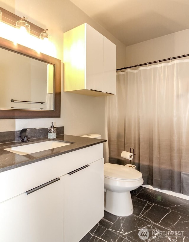 28209 241st Ave SE, Maple Valley, WA 98038 - bathroom featuring marble look tiles, vanity, toilet, and a shower with curtain