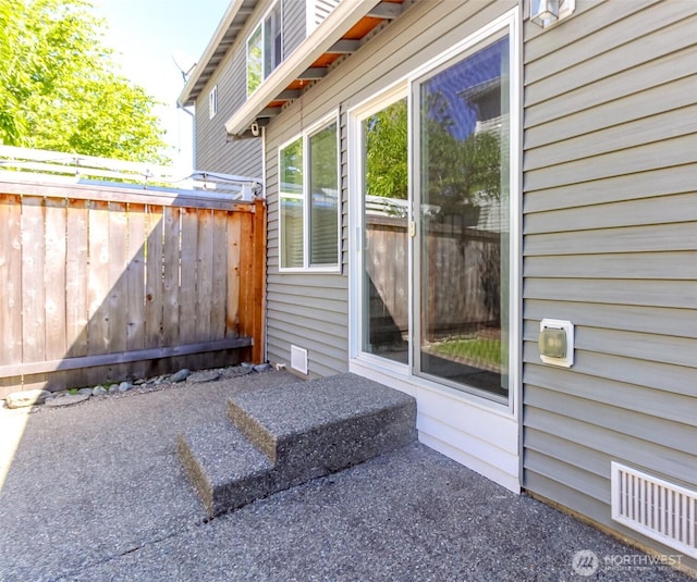 28209 241st Ave SE, Maple Valley, WA 98038 - view of exterior entry with a patio
