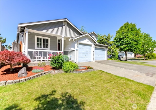 28209 241st Ave SE, Maple Valley, WA 98038 - view of front of property with a garage, a porch, asphalt driveway, and a front lawn