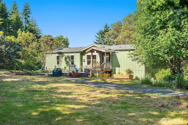 7459 SW 255th St, Vashon, WA 98070 - back of house with a yard