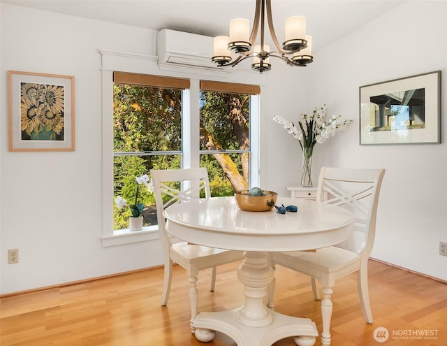7459 SW 255th St, Vashon, WA 98070 - dining area with a chandelier, healthy amount of natural light, and light wood finished floors