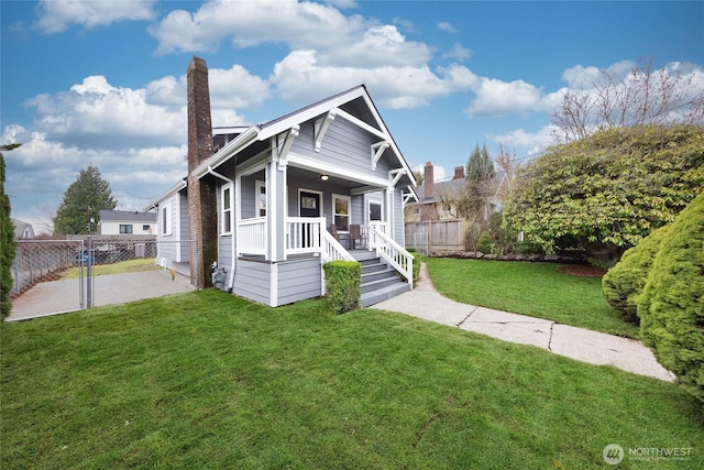 2333 31st Ave S, Seattle, WA 98144 - view of front facade with a chimney and covered porch