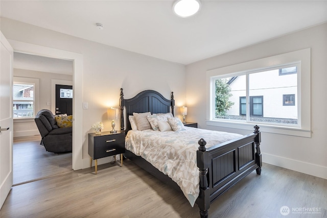 2333 31st Ave S, Seattle, WA 98144 - bedroom featuring light wood-style flooring and baseboards