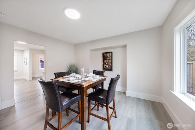 2333 31st Ave S, Seattle, WA 98144 - dining room featuring light wood-type flooring and baseboards