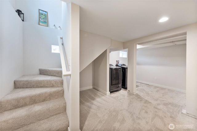 2333 31st Ave S, Seattle, WA 98144 - basement featuring washer and clothes dryer, light carpet, stairway, baseboards, and recessed lighting