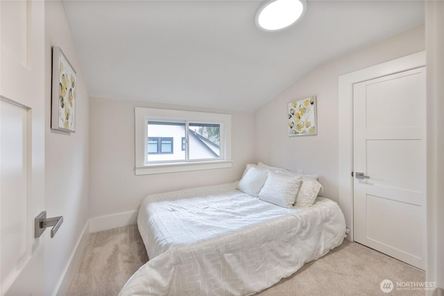 2333 31st Ave S, Seattle, WA 98144 - bedroom featuring carpet floors, vaulted ceiling, and baseboards