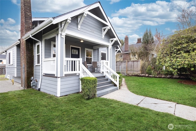 2333 31st Ave S, Seattle, WA 98144 - shotgun-style home with a porch and a chimney