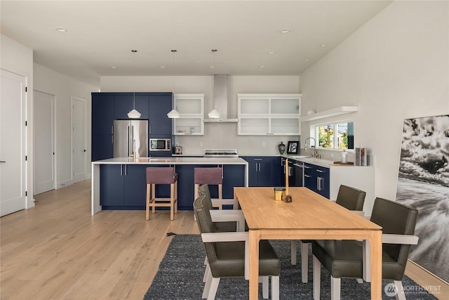 10227 26th Ave SW, Seattle, WA 98146 - dining space featuring light wood finished floors and recessed lighting