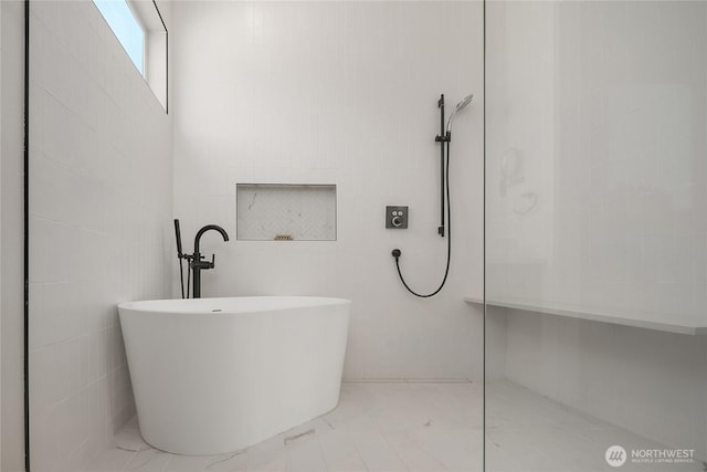 10227 26th Ave SW, Seattle, WA 98146 - bathroom with a walk in shower and a freestanding tub