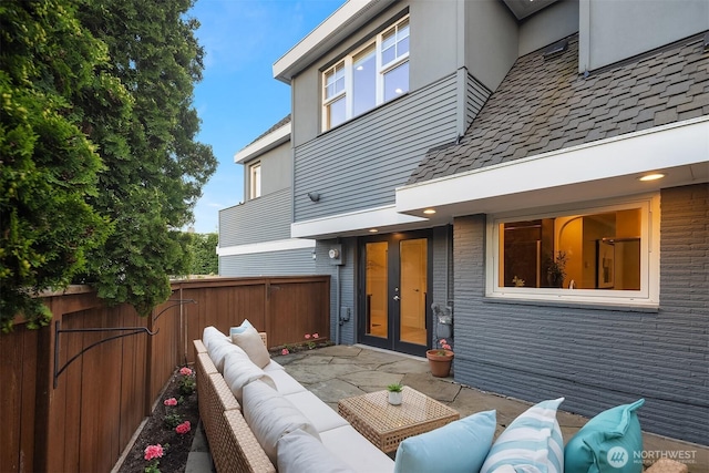 2532 Crestmont Pl W, Seattle, WA 98199 - fenced backyard with french doors, an outdoor living space, and a patio area