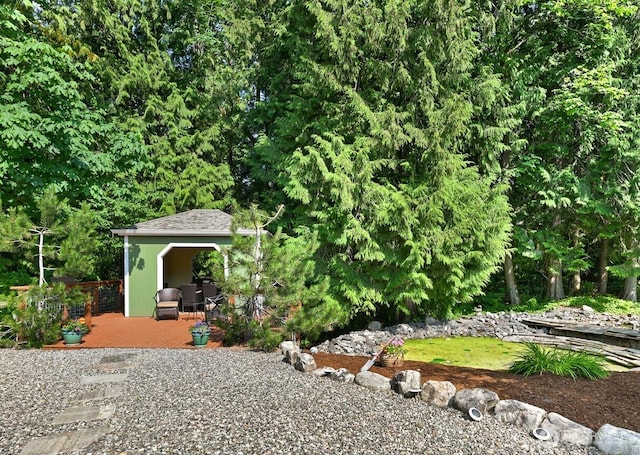 9135 Custer School Rd, Custer, WA 98240 - view of yard featuring a wooden deck and an outbuilding