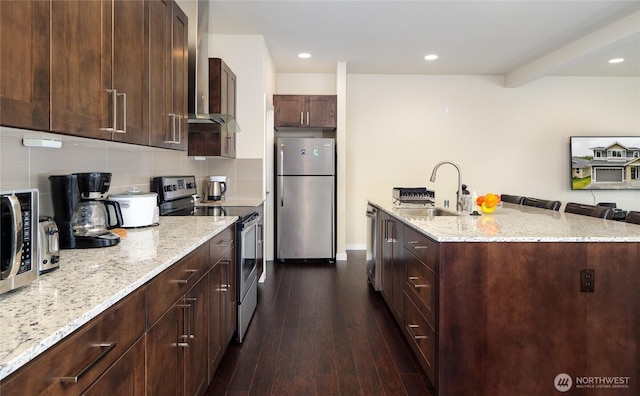 421 Lofgrin Rd, Sequim, WA 98382 - kitchen featuring stainless steel appliances, a sink, dark wood-type flooring, recessed lighting, and light stone counters