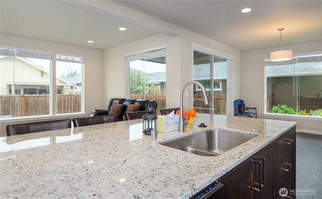 421 Lofgrin Rd, Sequim, WA 98382 - kitchen with a sink, recessed lighting, dark wood-style flooring, decorative light fixtures, and dark brown cabinetry
