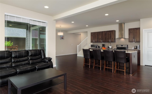 421 Lofgrin Rd, Sequim, WA 98382 - living area featuring dark wood finished floors, stairs, baseboards, and recessed lighting