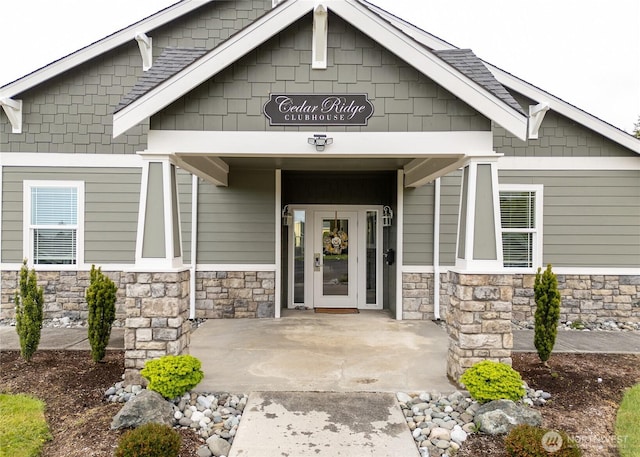 421 Lofgrin Rd, Sequim, WA 98382 - doorway to property featuring stone siding