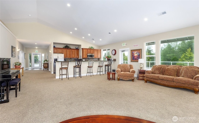 421 Lofgrin Rd, Sequim, WA 98382 - living area with light carpet, recessed lighting, and high vaulted ceiling